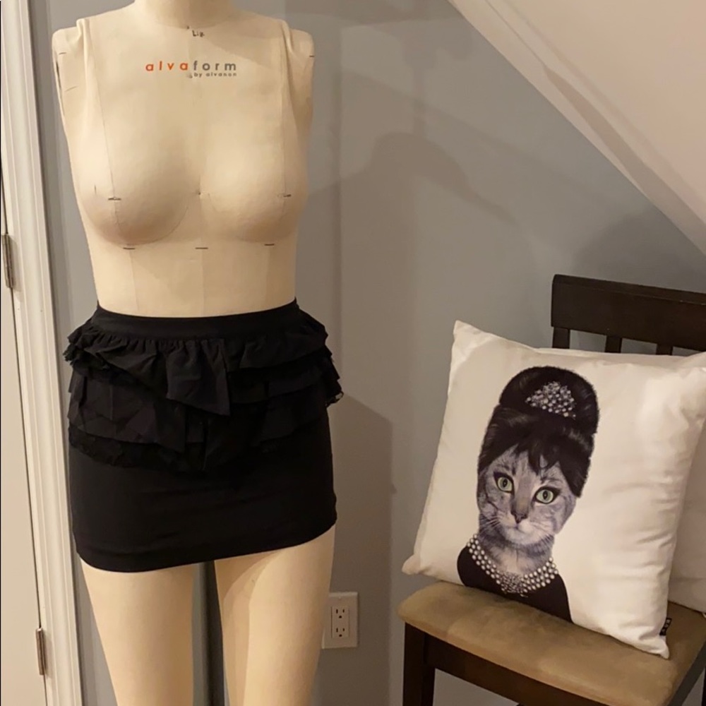 Marciano black mini skirt with ruffles and lace.